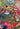 Water lily and abstract details in painting of tiger lying in water above a water fall.